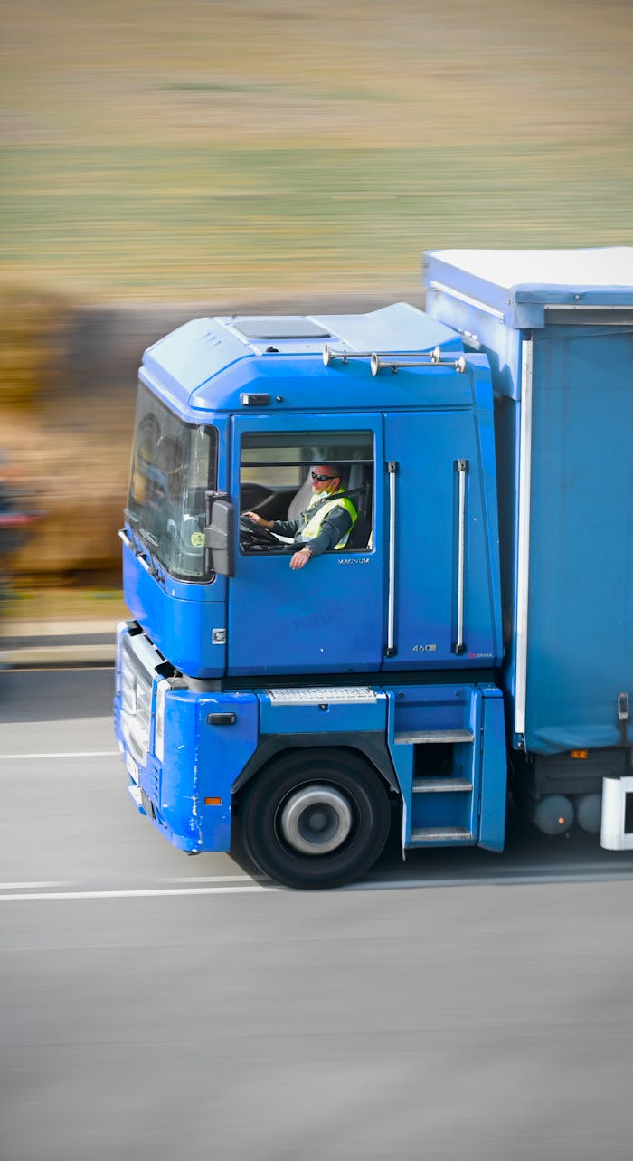 A Blue Truck on the Road